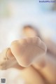 A close up of a person's foot with a pair of socks.